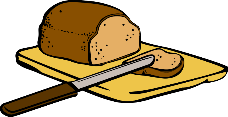 Bread with knife on cutting board