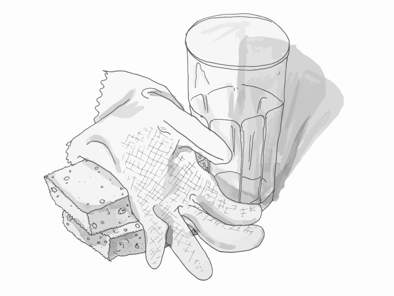 Sponges, plastic glove and a mug